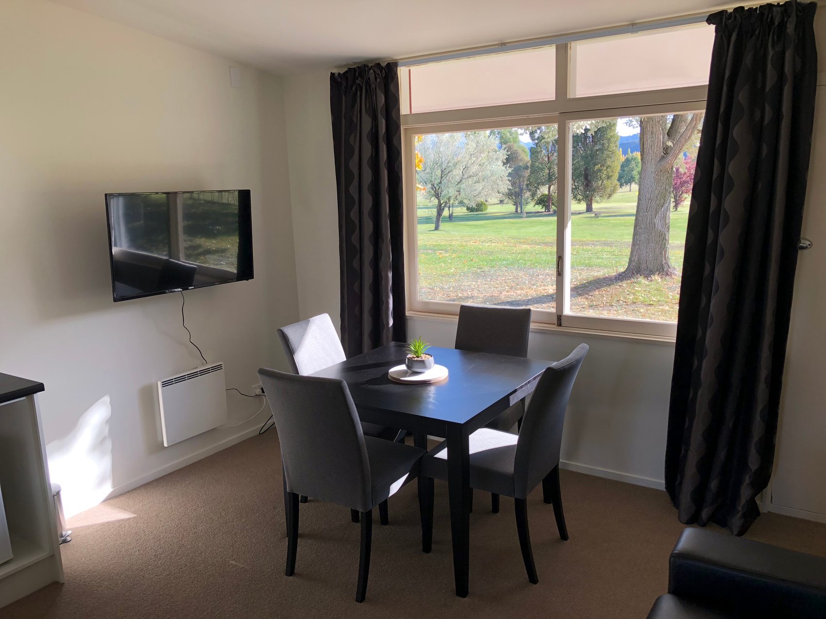 Apartment dining table looking out over the golf course